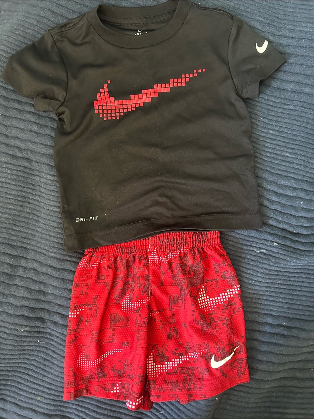 Nike Black Tee with Red Pixel Swoosh & Red Patterned Shorts